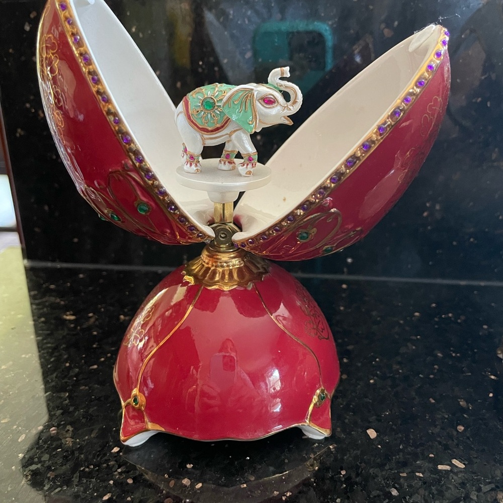 Elegant Red and Gold Decorative Egg by [Brand]